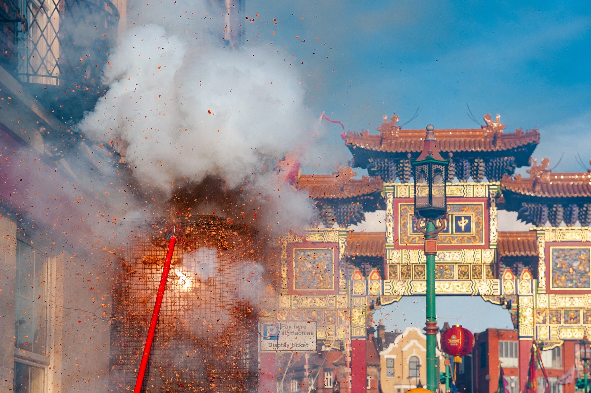 Fire-crackers exploding in a container outside the Chinese Arch in Liverpool