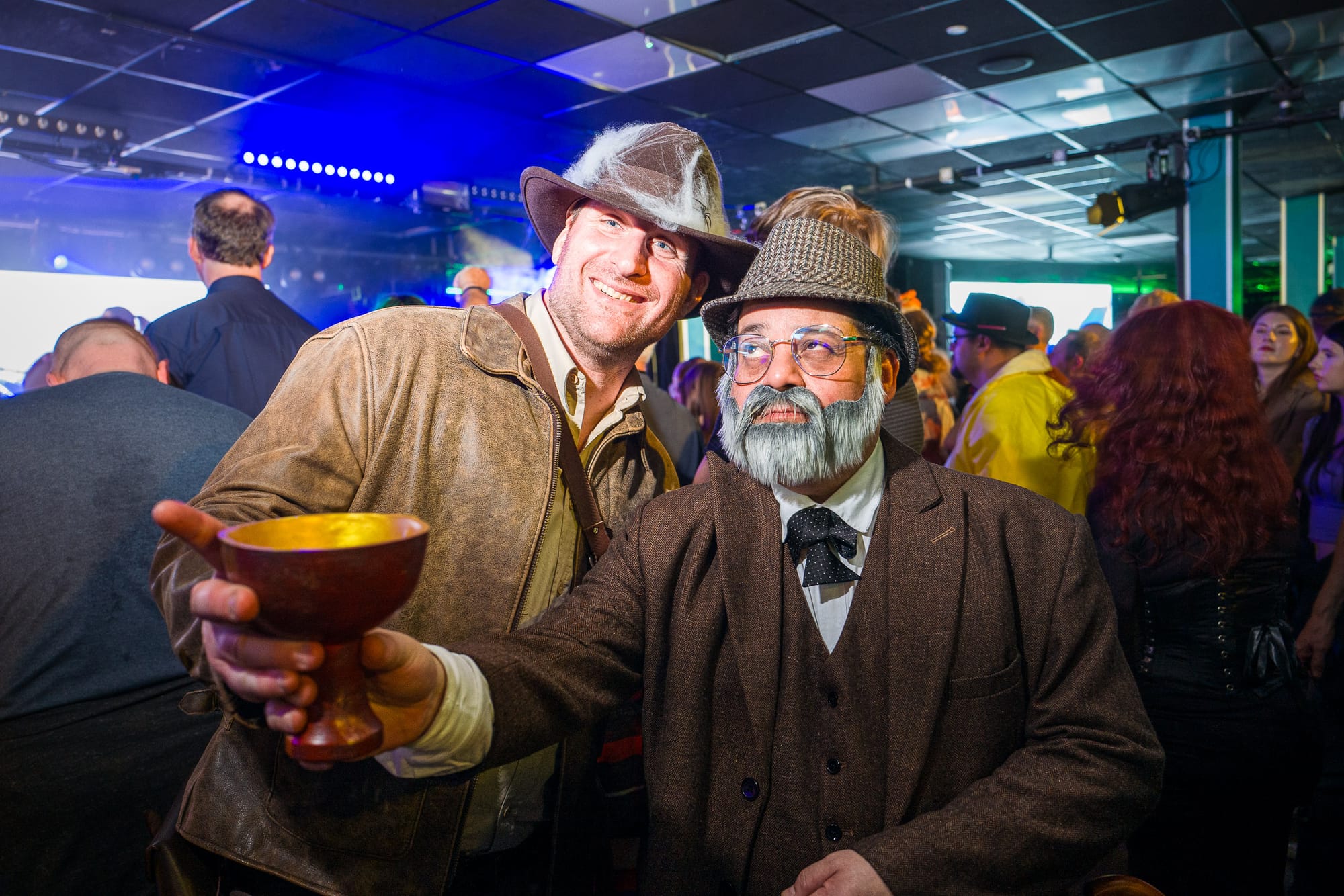 Two people cosplay as Indiana Jones and his father.