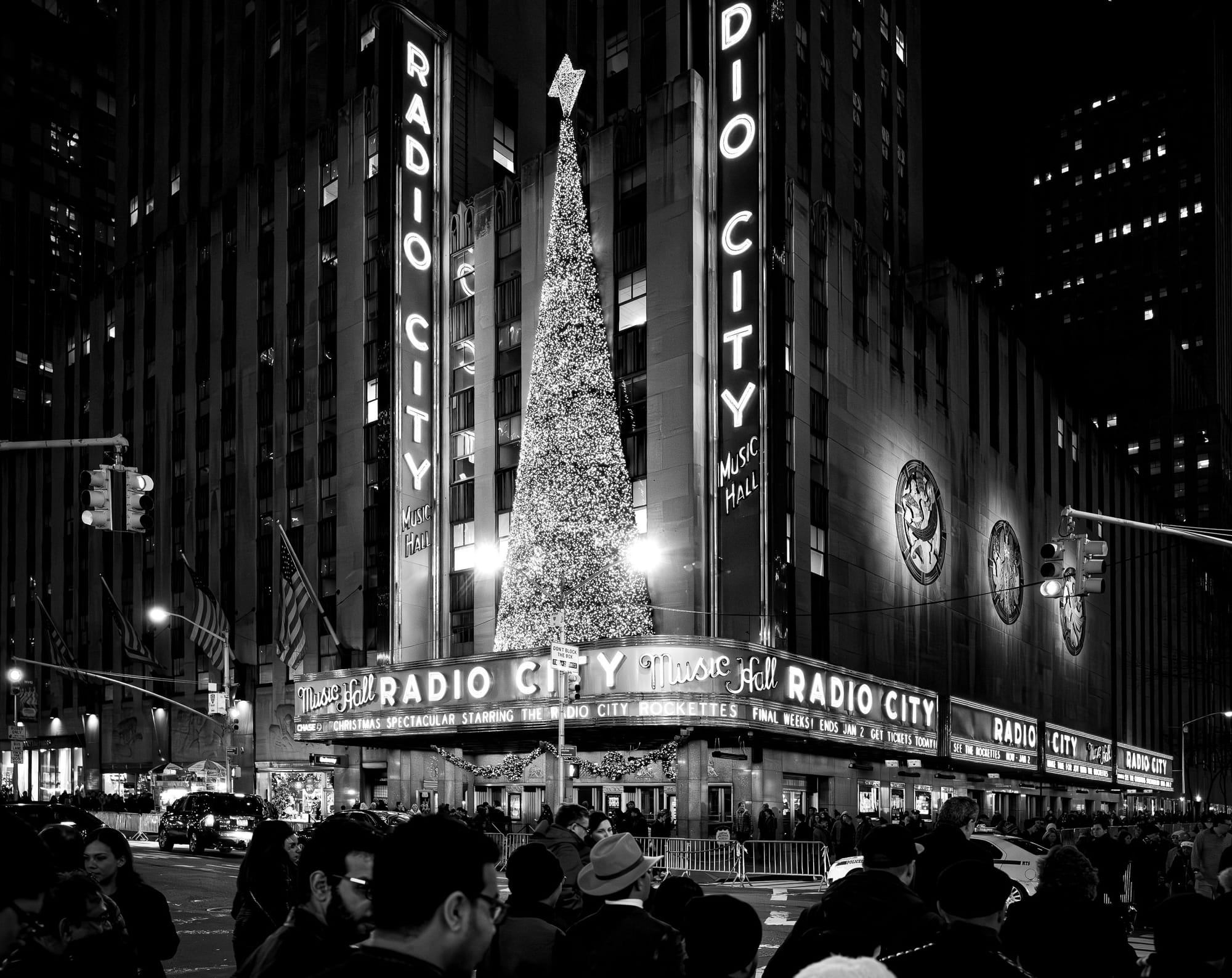 A an office block tall Christmas tree sits outside the Radio City Building.